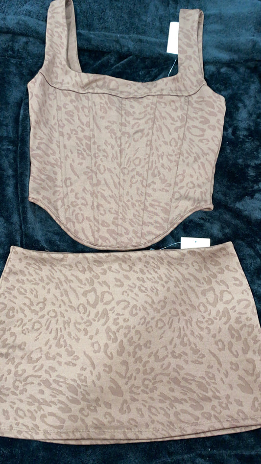 Woman’s skirt set corset like top sucks the tummy in